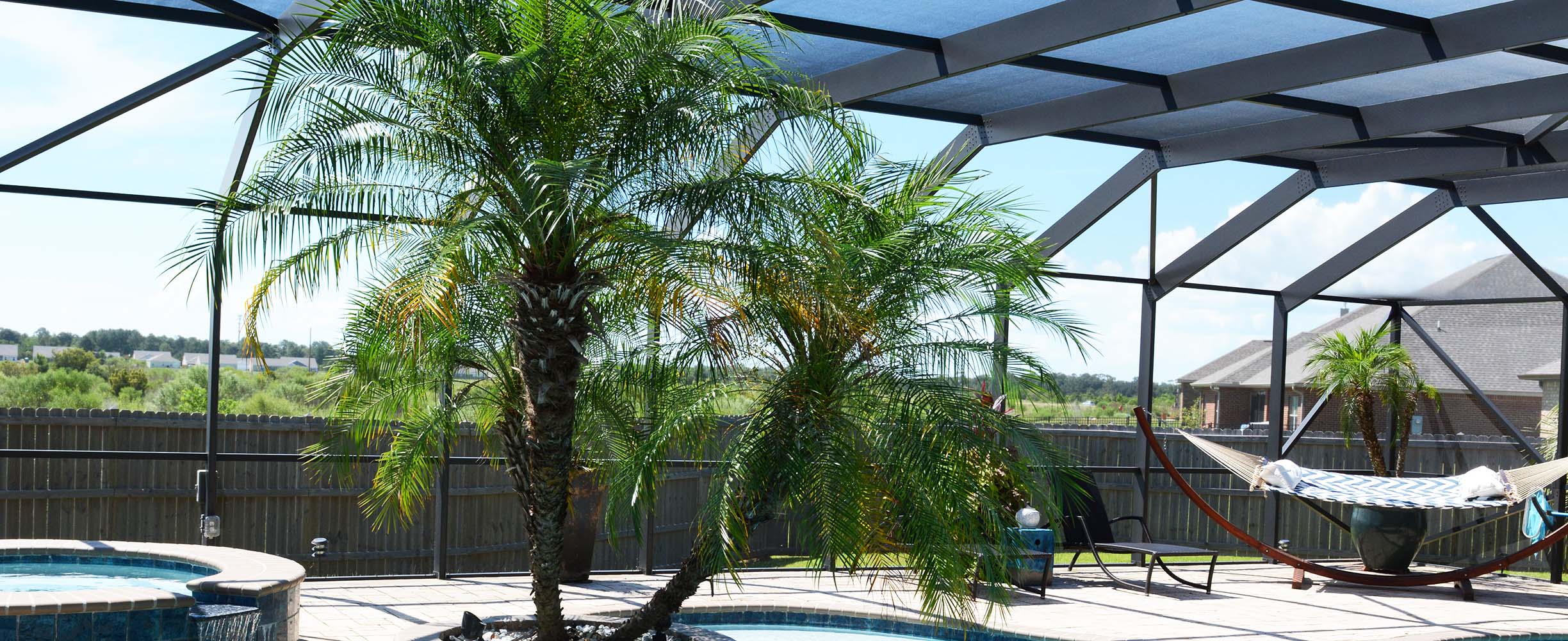 Sturfy weather prepared swimming pool enclosure in Foley, Alabama