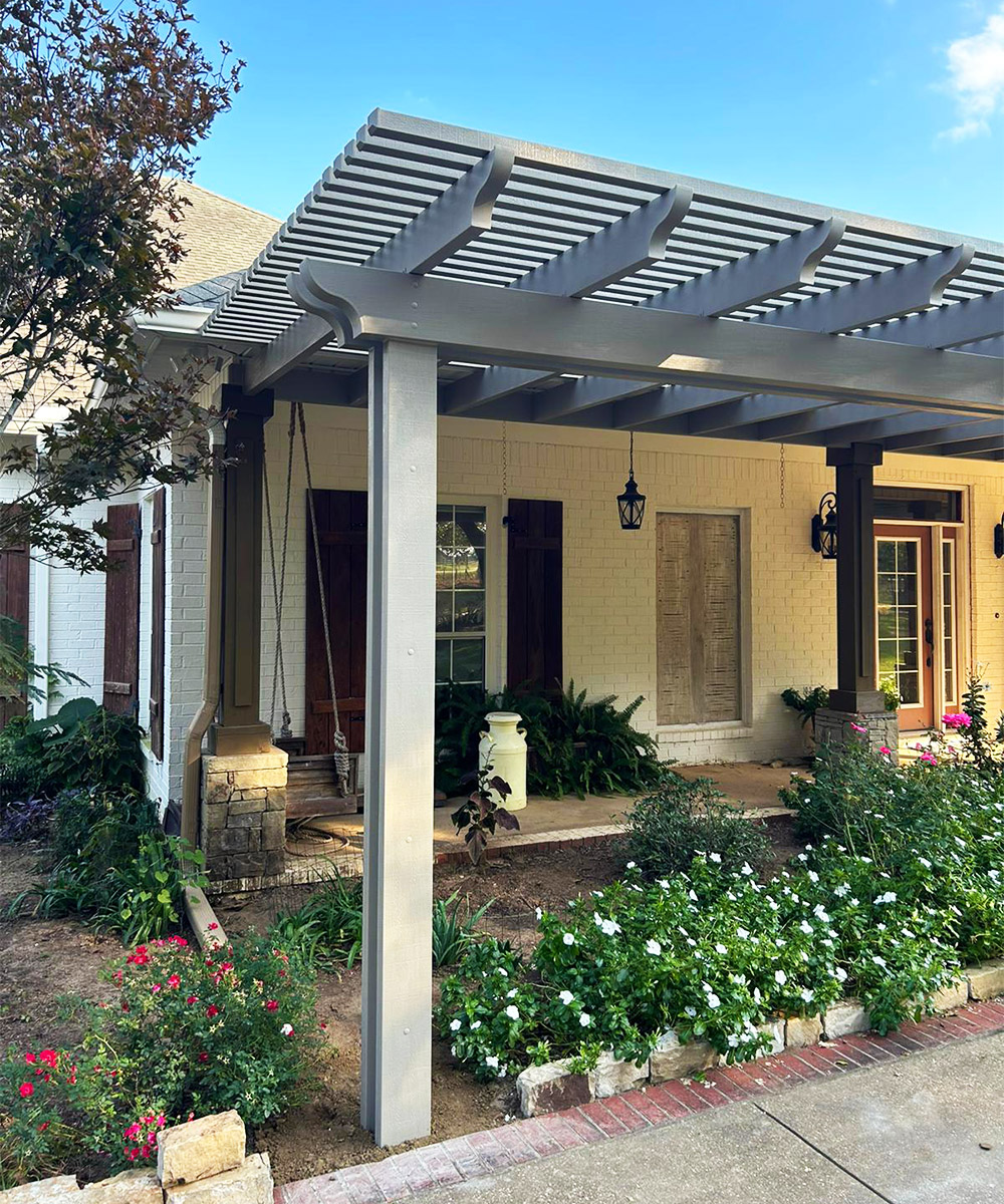 Custom pergola patio structure adding shade and outdoor living space to a Southern Alabama home