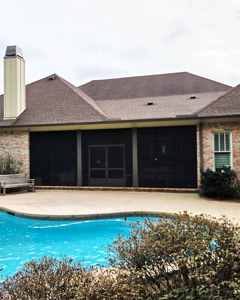 Custom screen room providing protected outdoor living at a Baldwin County, Alabama home