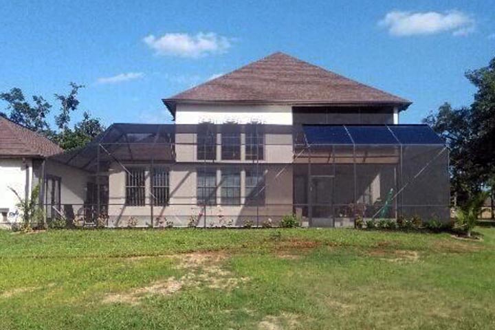 Lexan roof panels installed over a custom residential pool enclosure