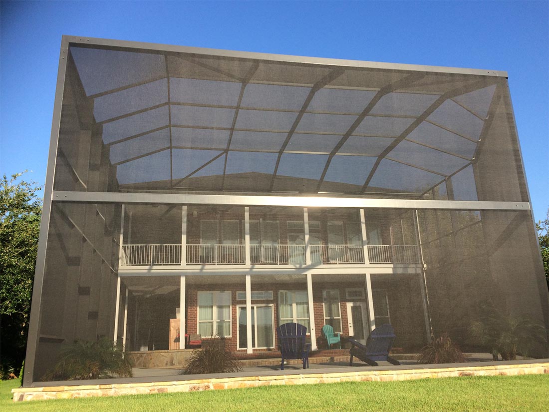 Exterior front elevation of a custom MegaView pool screen enclosure
