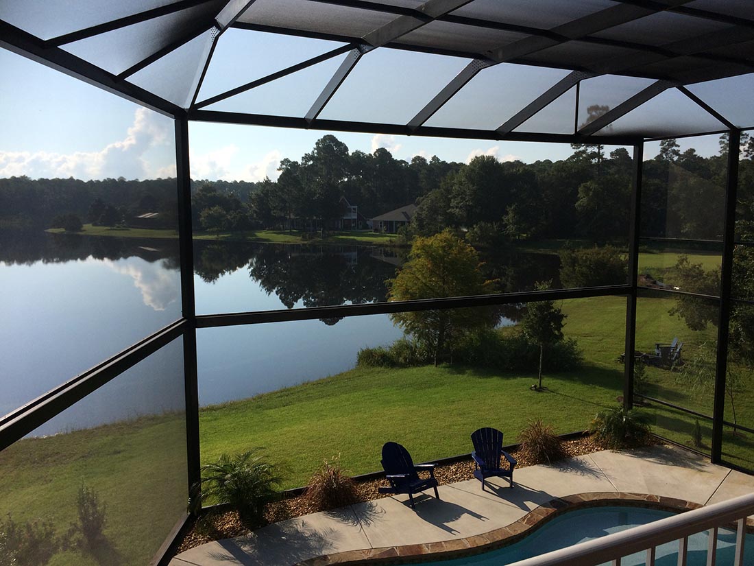 Wide panoramic opening and structural framing inside a MegaView pool enclosure