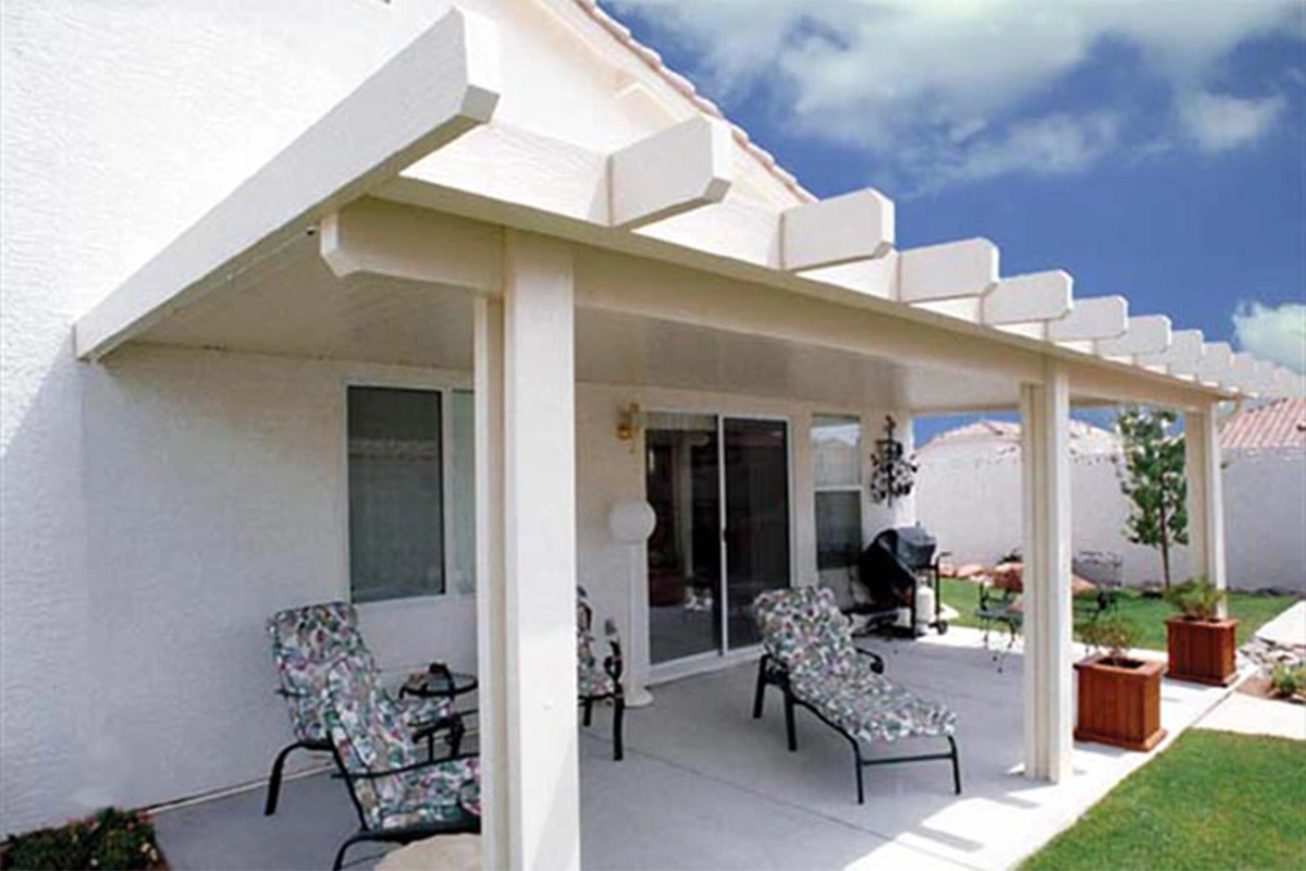 Custom pergola creating filtered shade over a South Alabama patio