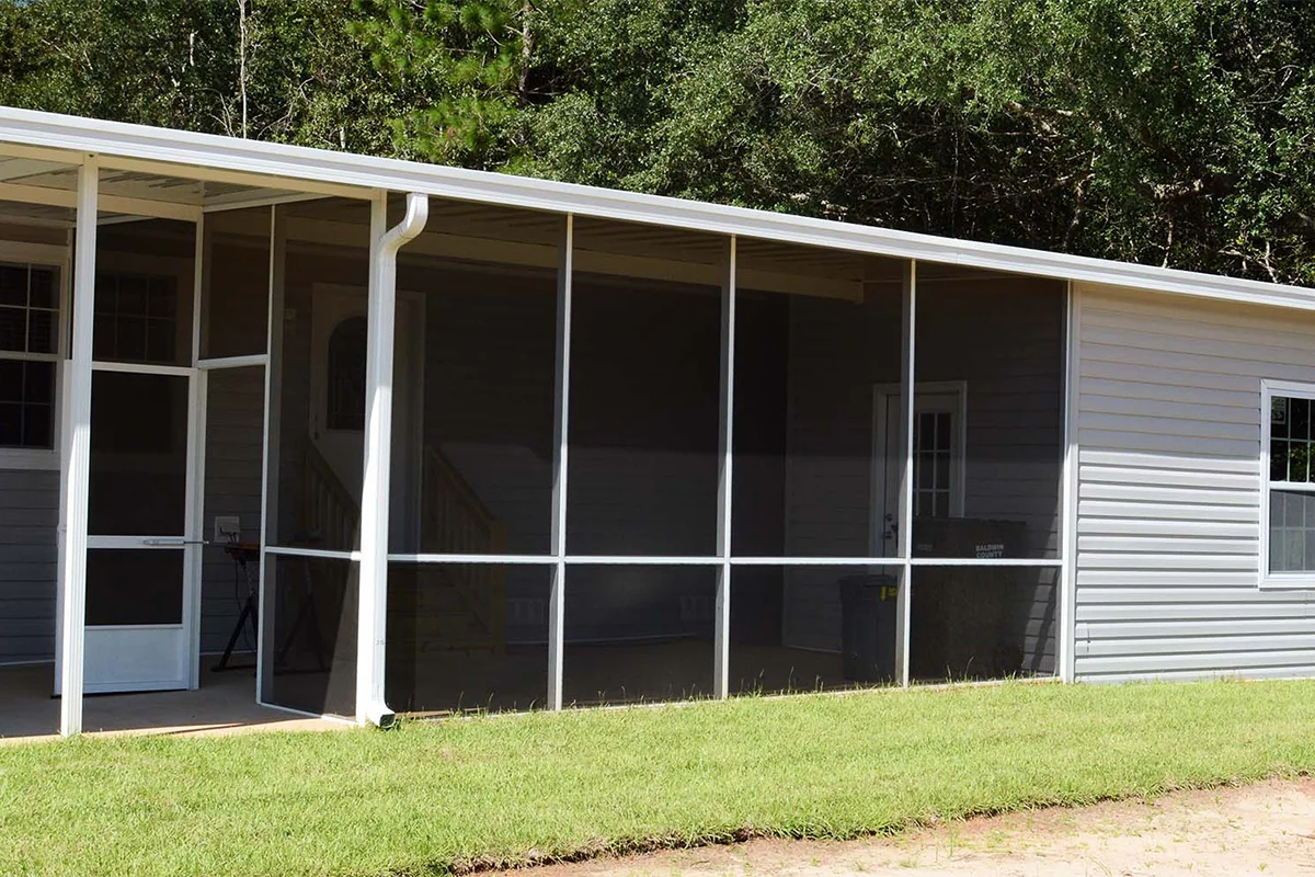 Custom screened patio enclosure at a South Alabama home