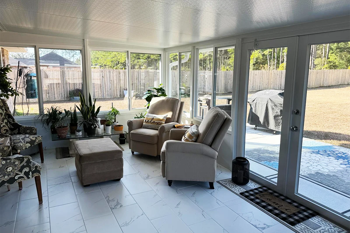 Custom sunroom with broad windows at a South Alabama home