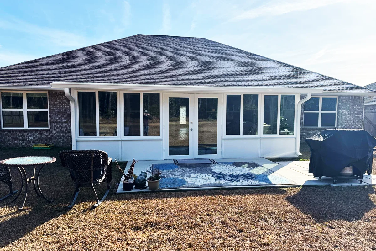 Sunroom addition extending a South Alabama house